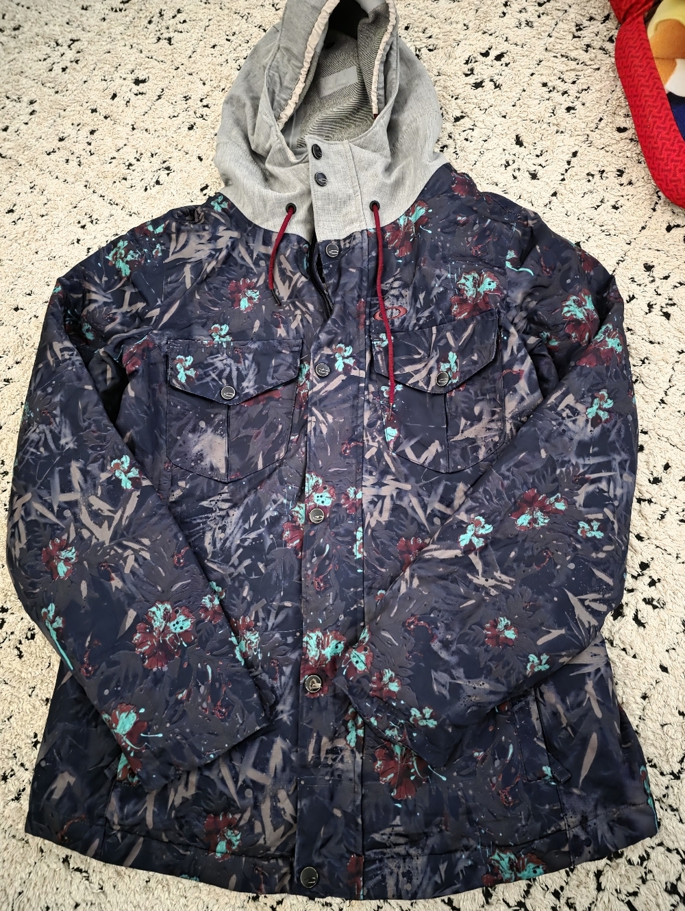 Oakley Navy Floral-Print Ski Jacket with Teal and Burgundy Accents